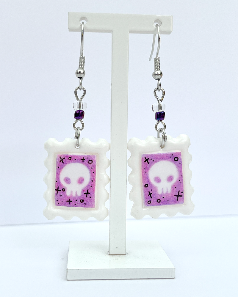 Skulls | Polymer clay postal stamp earrings